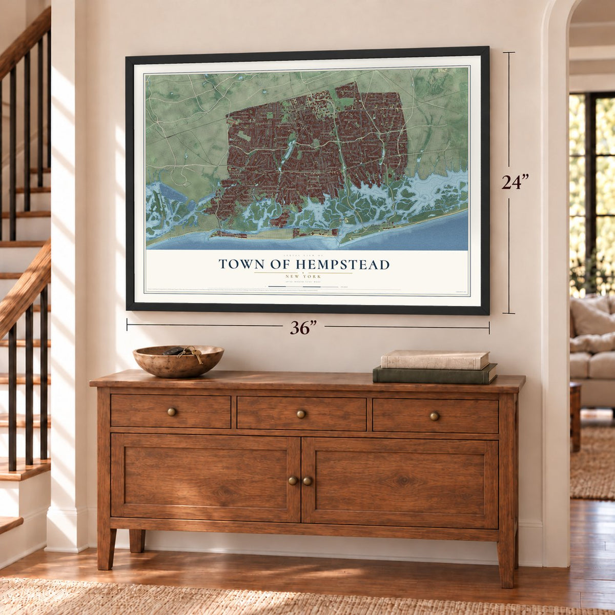 Town of Hempstead, New York map, 24 x 36 inch print in a black frame above a dresser by a staircase