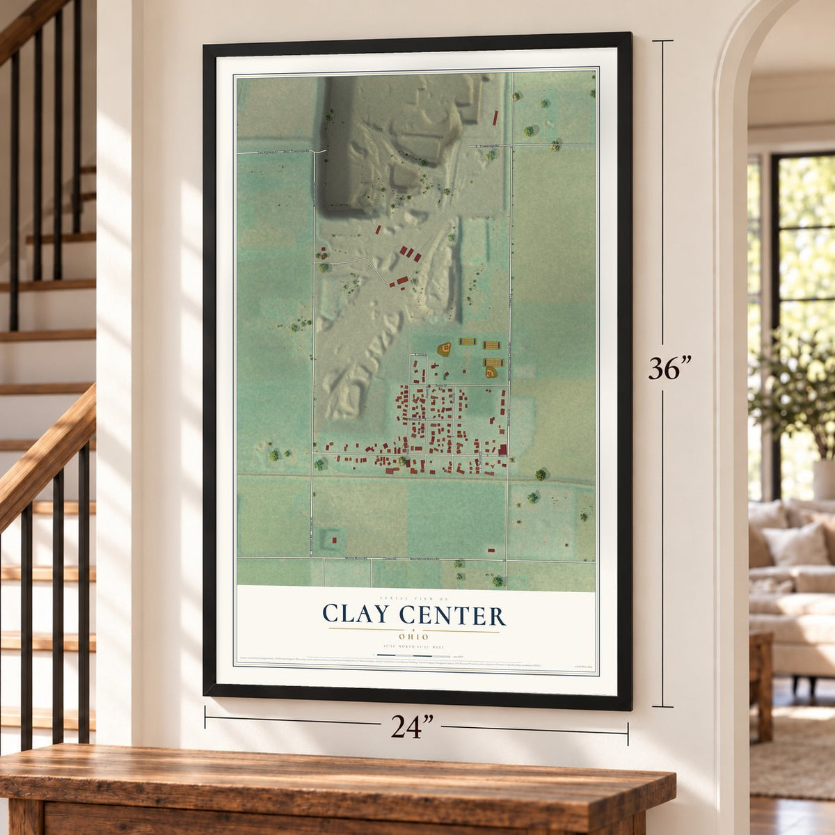 Clay Center, Ohio map, 24 x 36 inch print in a black frame by a staircase
