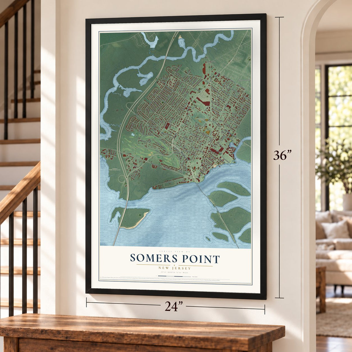 Somers Point, New Jersey map, 24 x 36 inch print in a black frame by a staircase