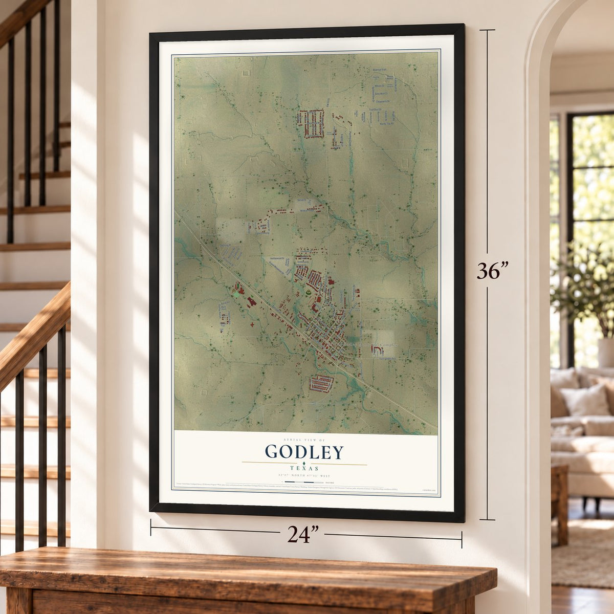Godley, Texas map, 24 x 36 inch print in a black frame by a staircase