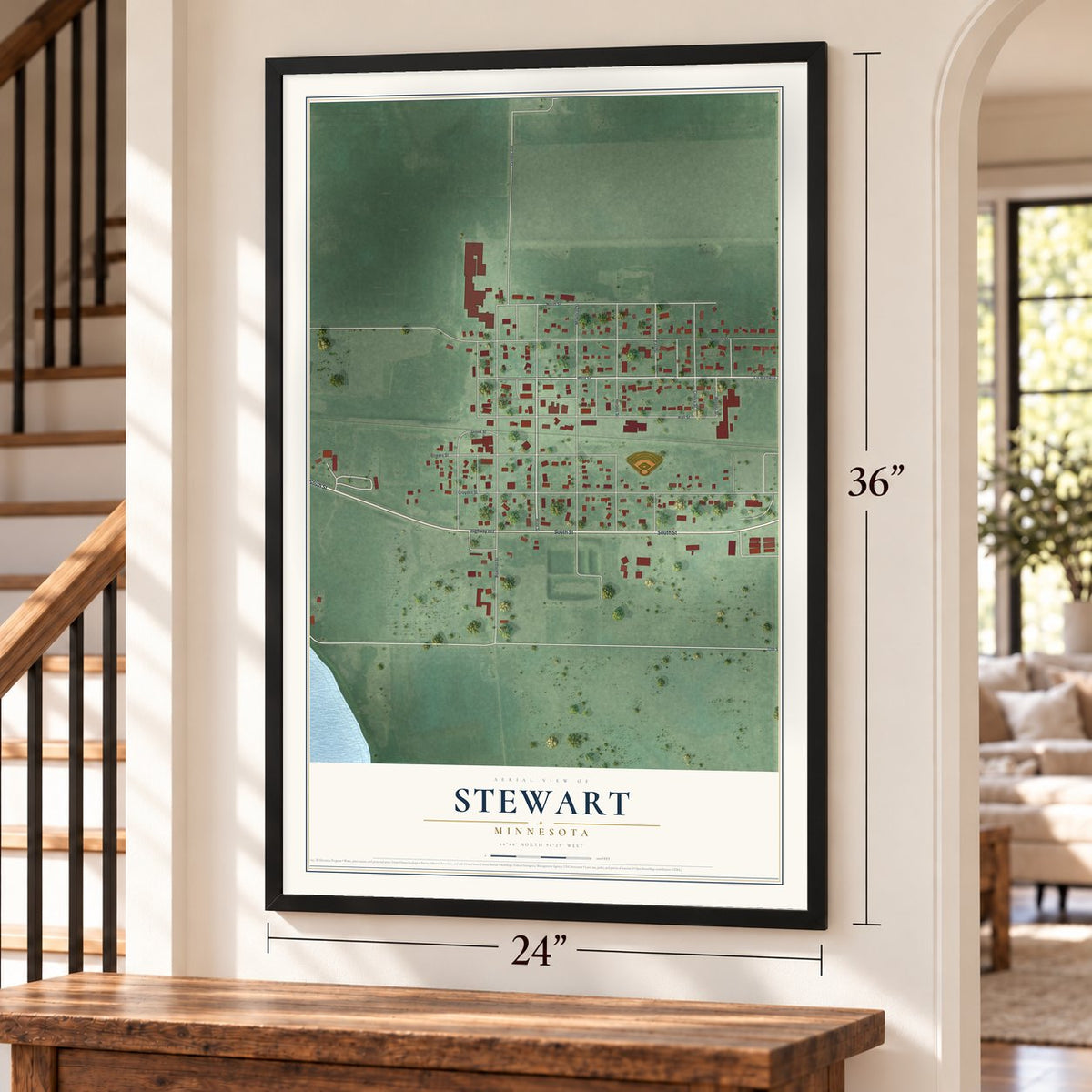 Stewart, Minnesota map, 24 x 36 inch print in a black frame by a staircase