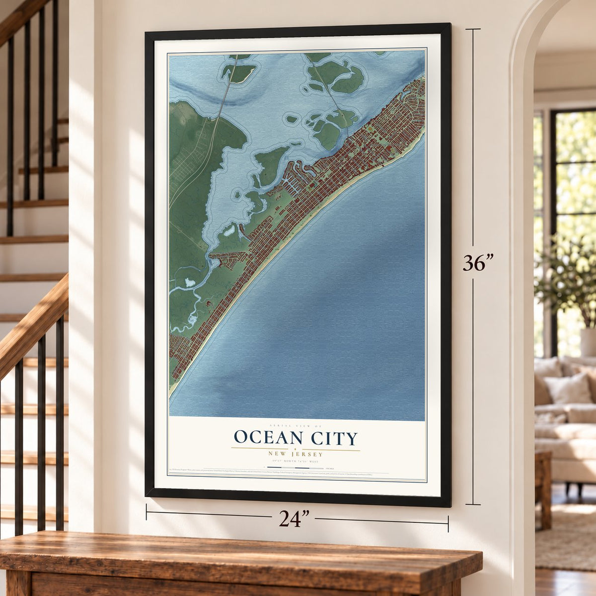Ocean City, New Jersey map, 24 x 36 inch print in a black frame by a staircase