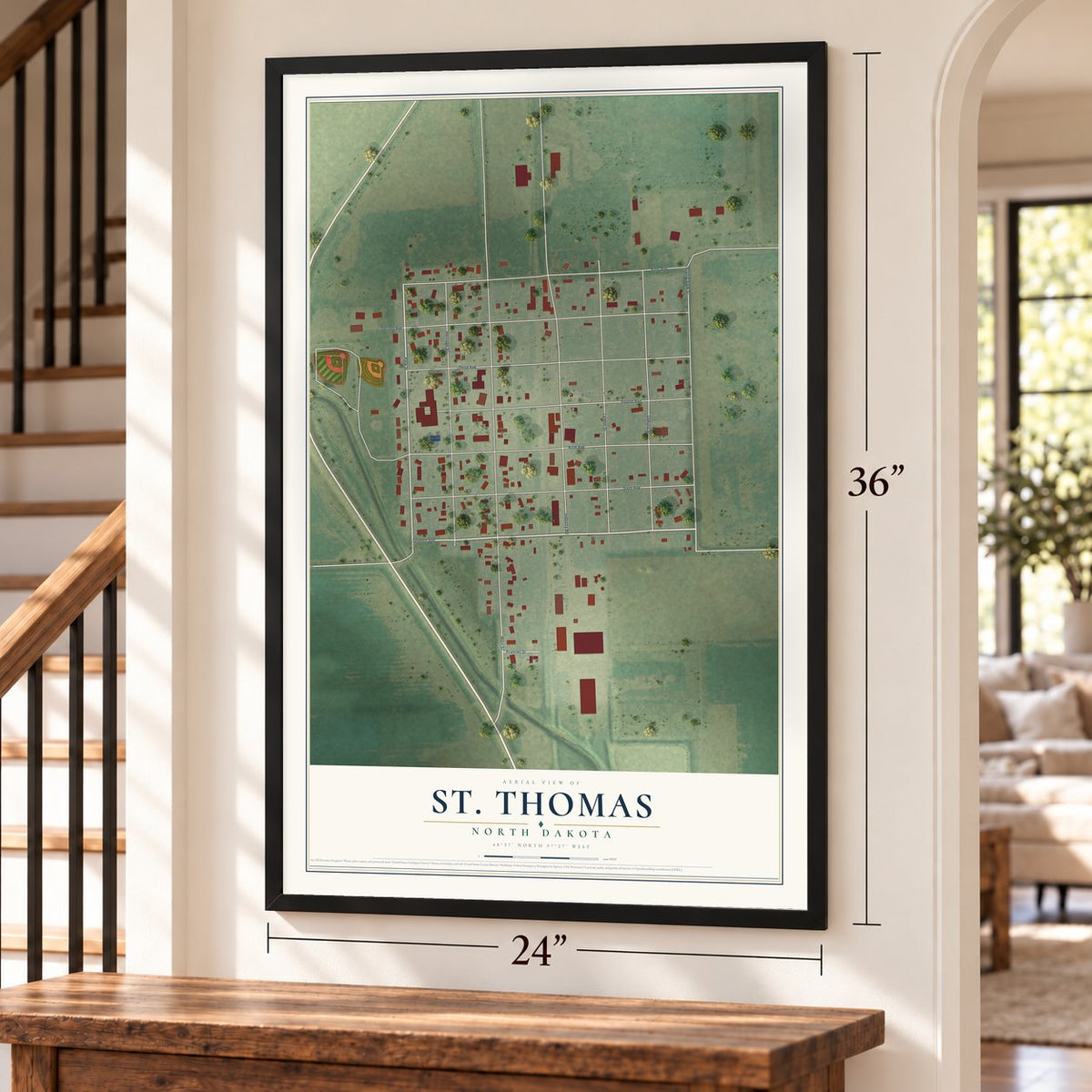 St. Thomas, North Dakota map, 24 x 36 inch print in a black frame by a staircase
