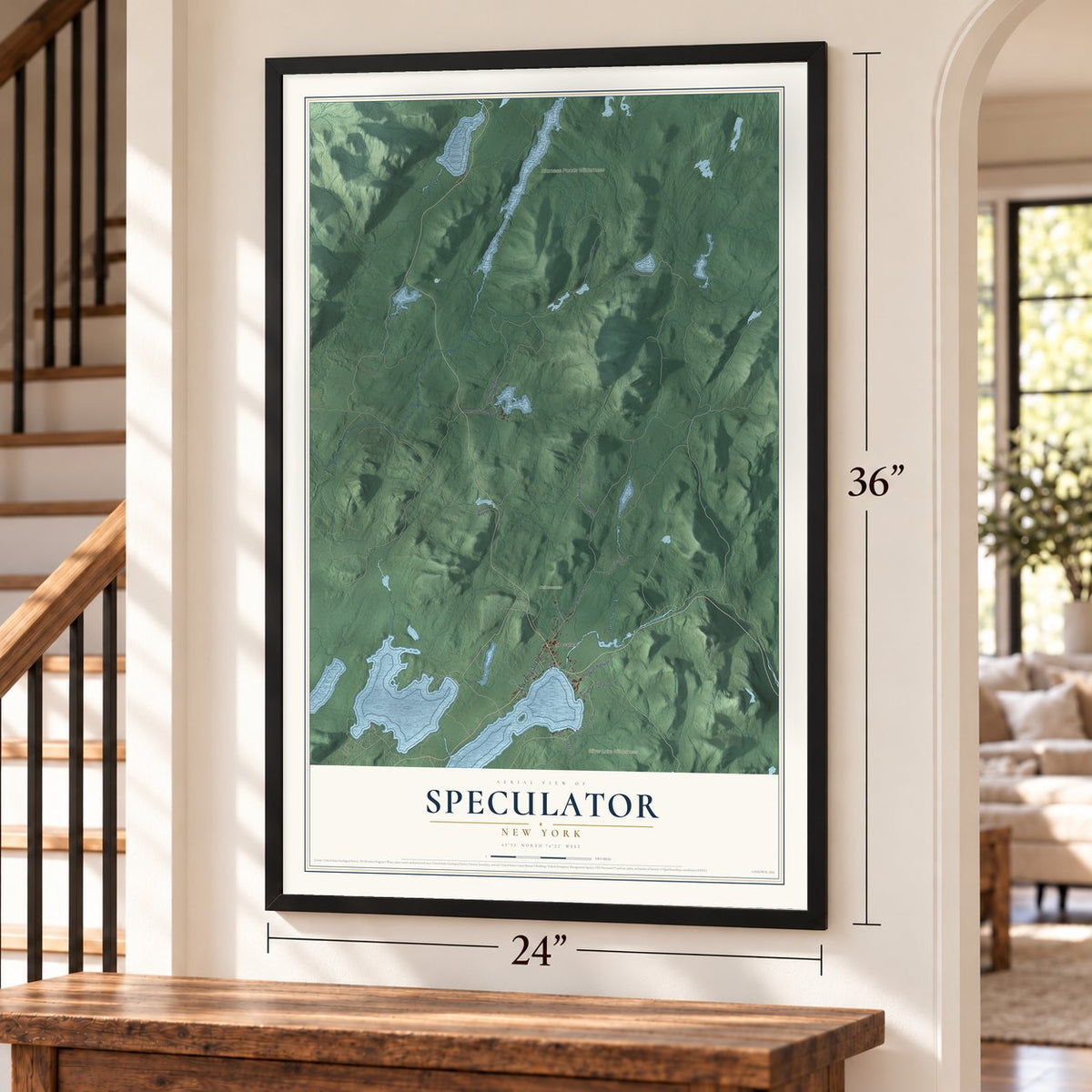 Speculator, New York map, 24 x 36 inch print in a black frame by a staircase