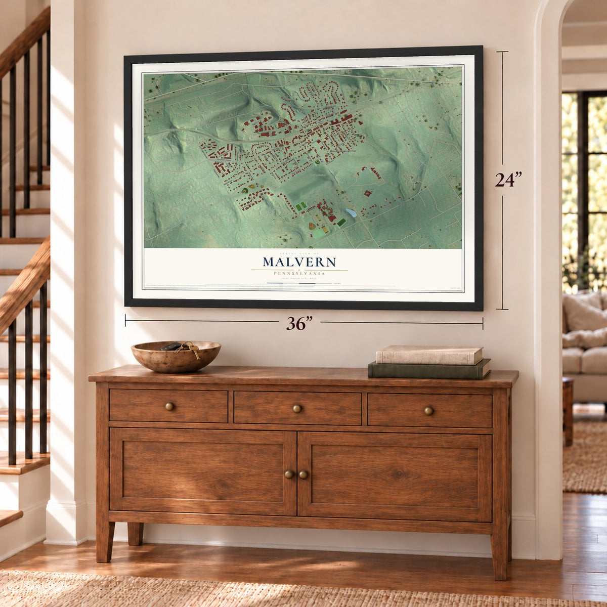 Malvern, Pennsylvania map, 24 x 36 inch print in a black frame above a dresser by a staircase