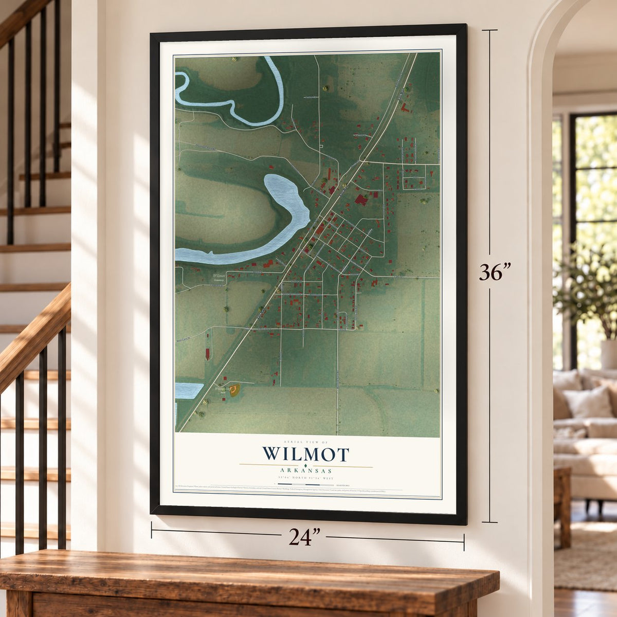 Wilmot, Arkansas map, 24 x 36 inch print in a black frame by a staircase
