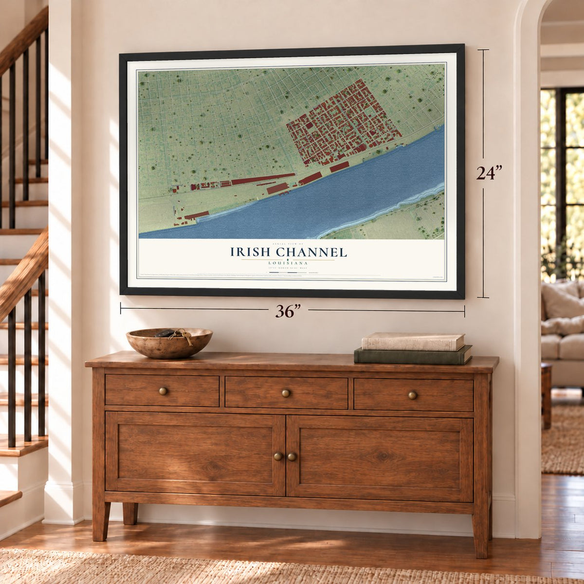 Irish Channel, Louisiana map, 24 x 36 inch print in a black frame above a dresser by a staircase