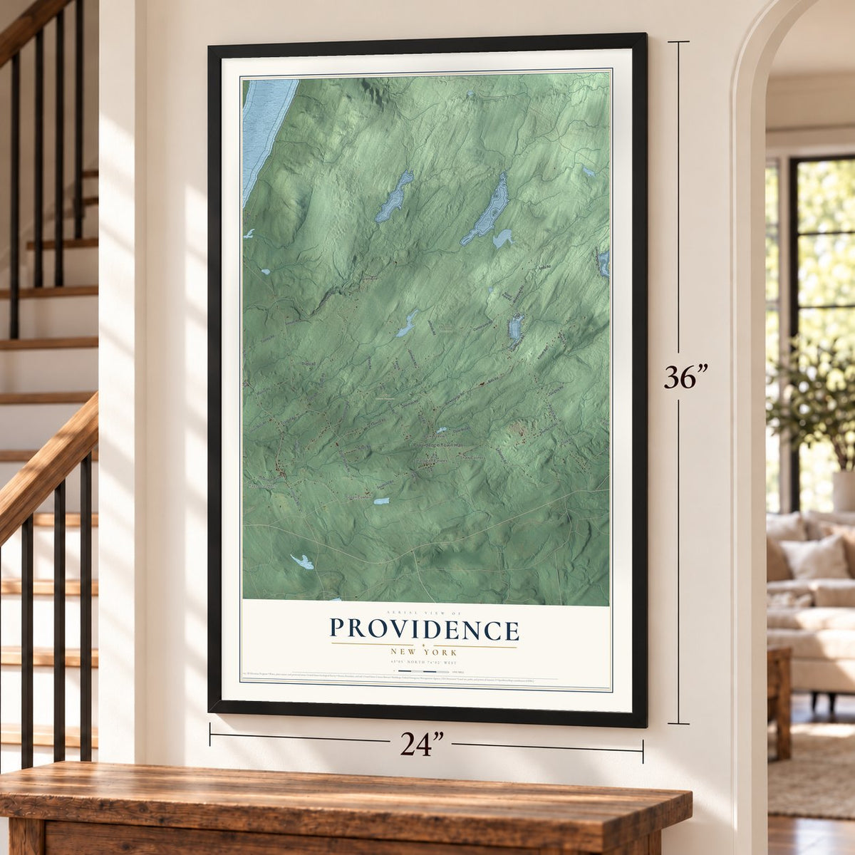 Providence, New York map, 24 x 36 inch print in a black frame by a staircase