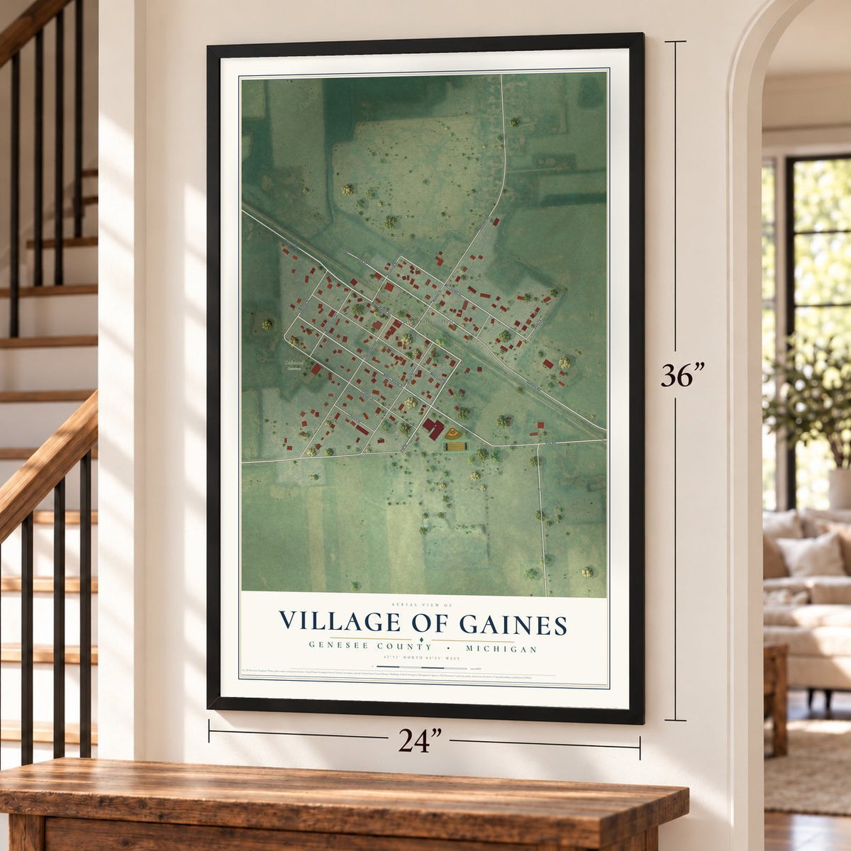 Gaines, Michigan map, 24 x 36 inch print in a black frame by a staircase