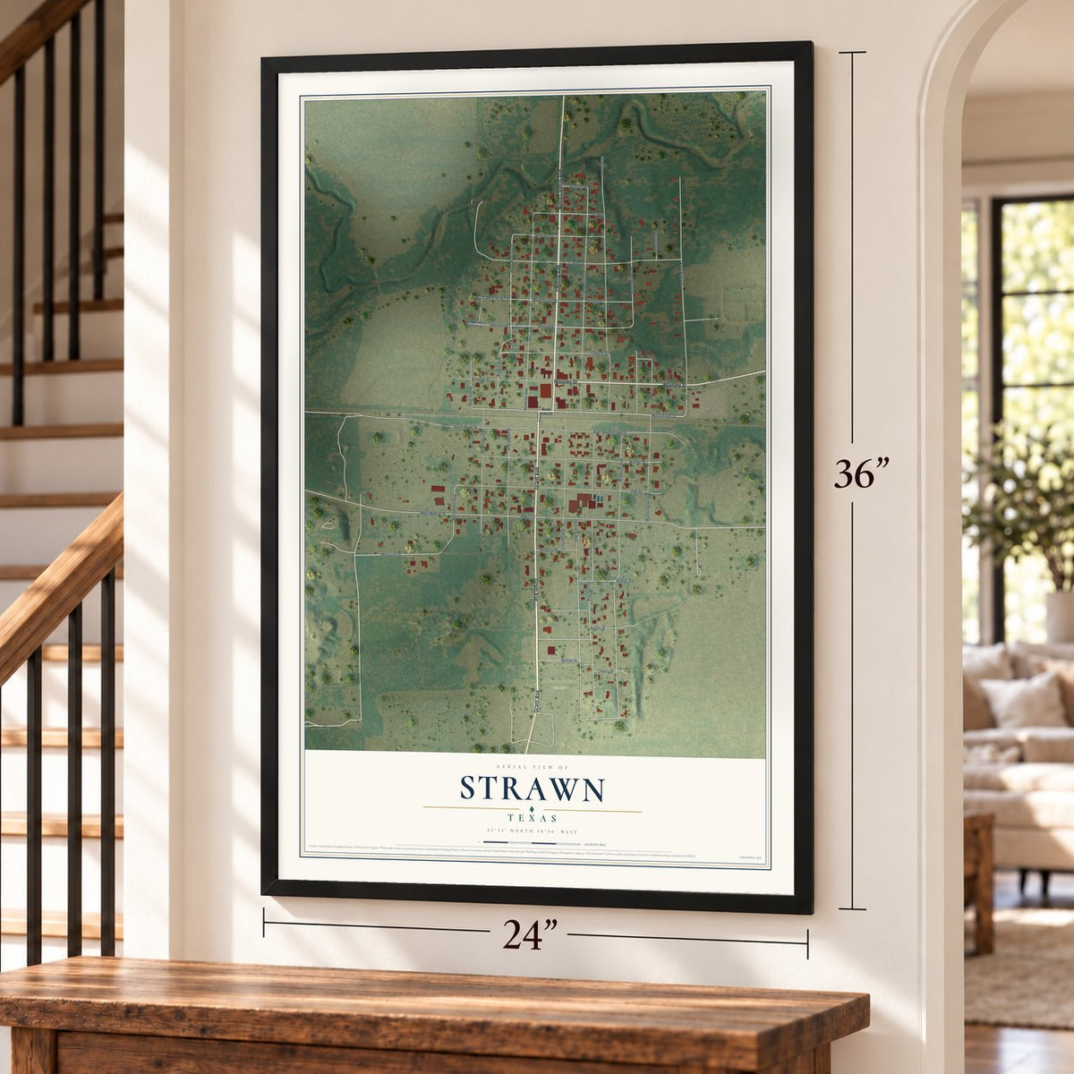 Strawn, Texas map, 24 x 36 inch print in a black frame by a staircase