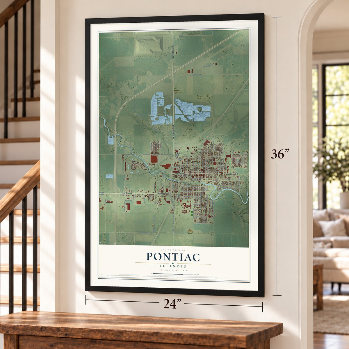 Pontiac, Illinois map, 24 x 36 inch print in a black frame by a staircase