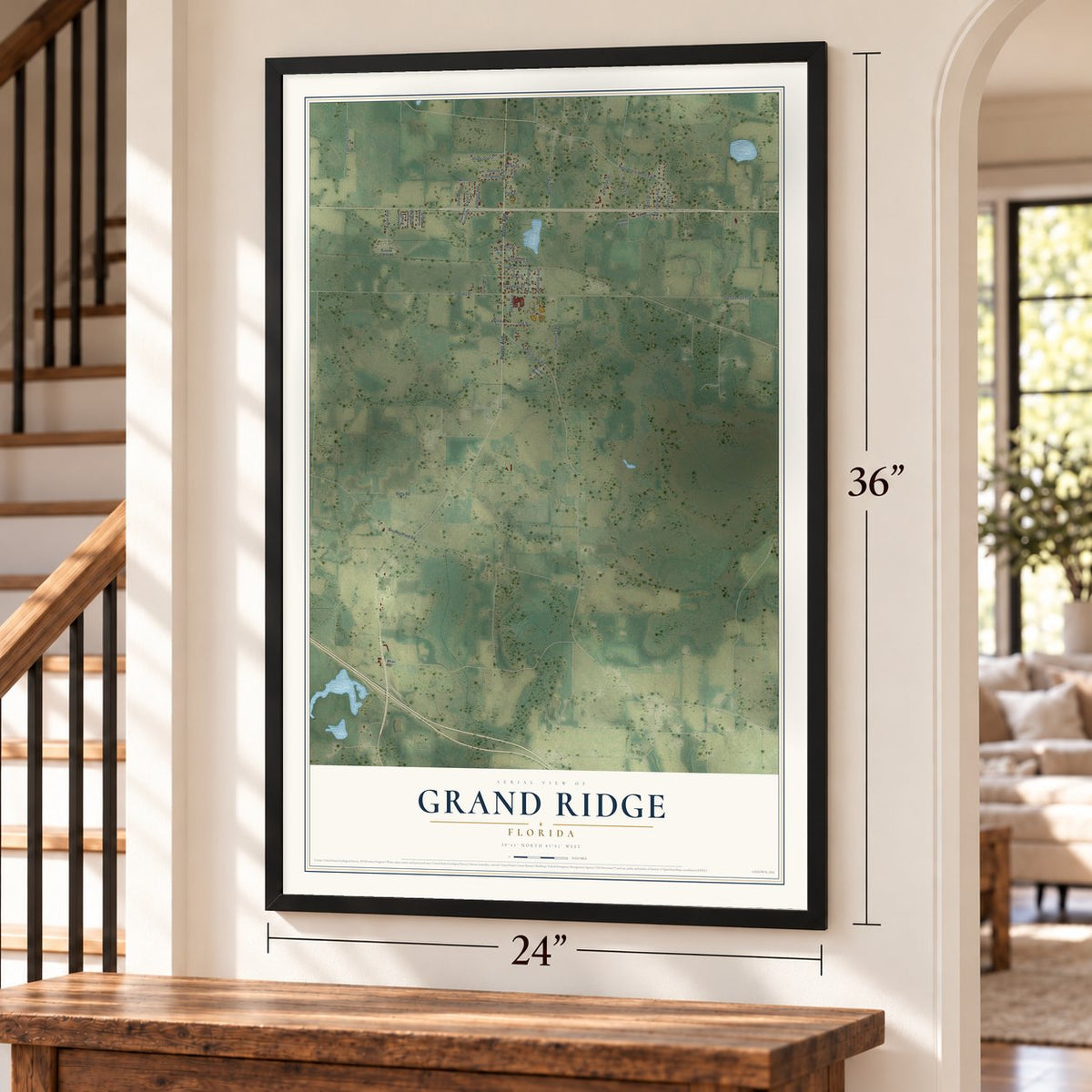 Grand Ridge, Florida map, 24 x 36 inch print in a black frame by a staircase