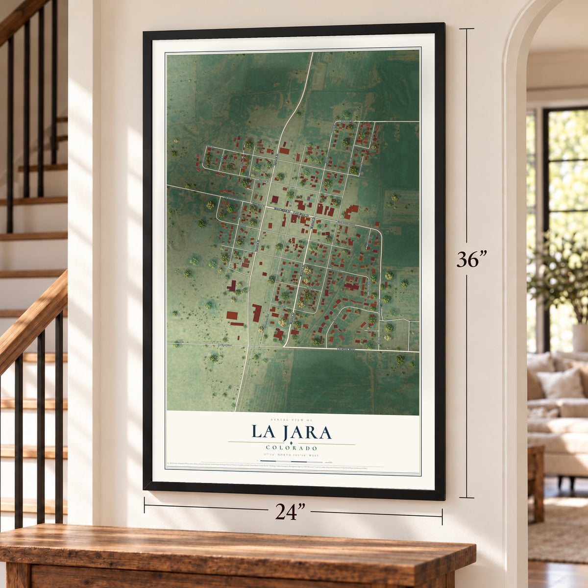 La Jara, Colorado map, 24 x 36 inch print in a black frame by a staircase