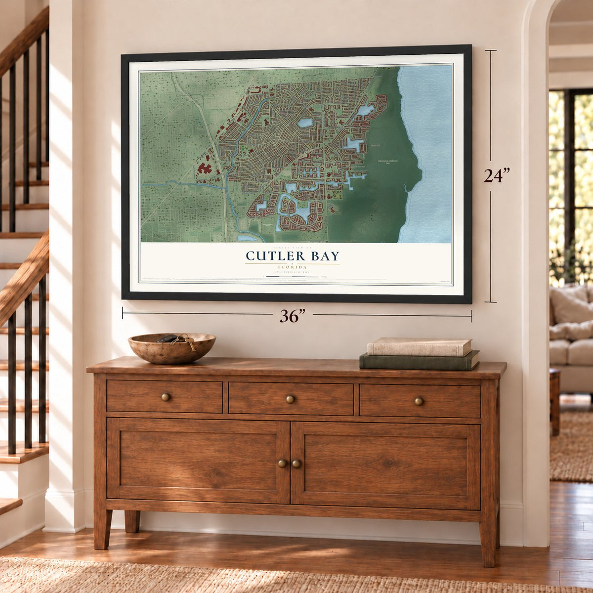Cutler Bay, Florida map, 24 x 36 inch print in a black frame above a dresser by a staircase