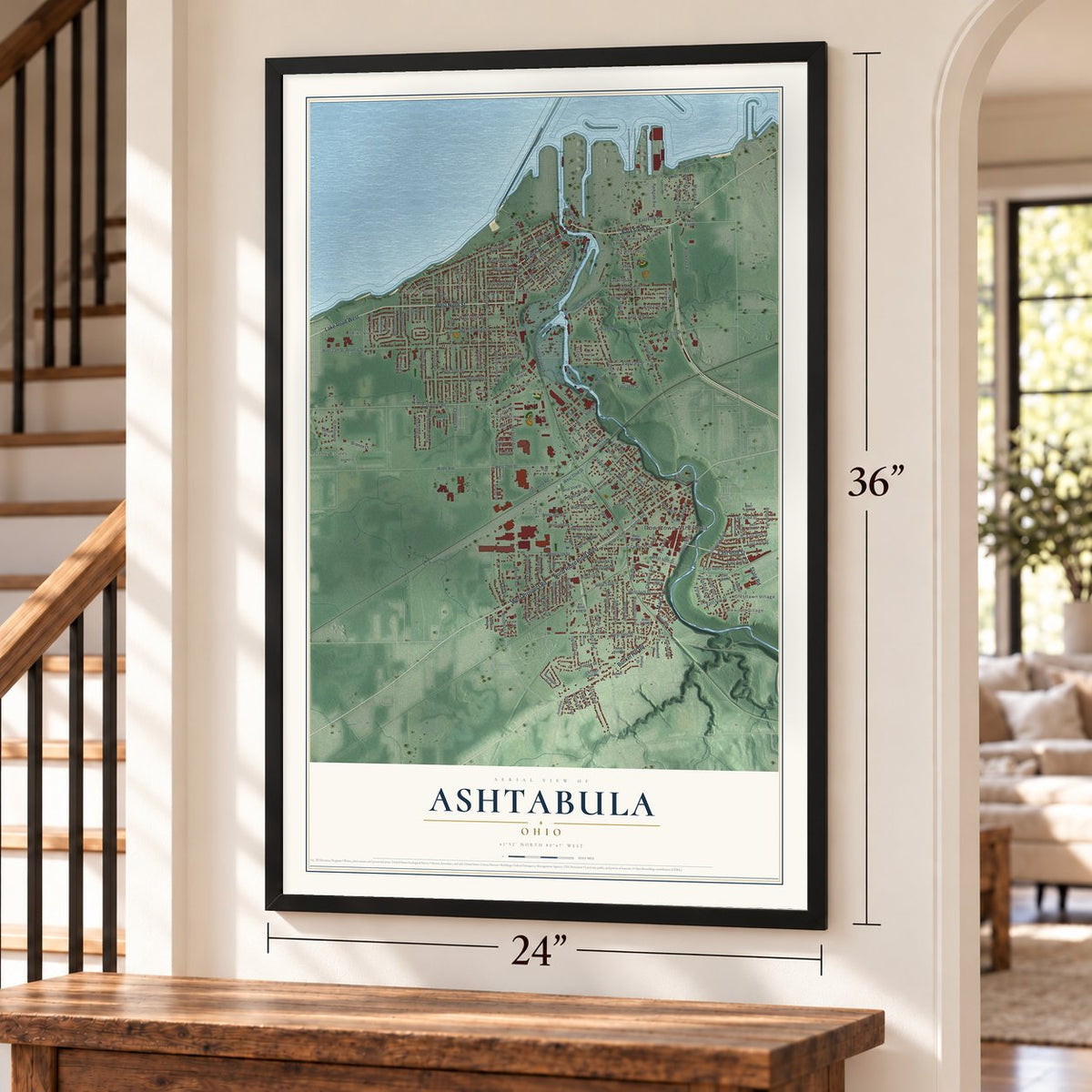Ashtabula, Ohio map, 24 x 36 inch print in a black frame by a staircase