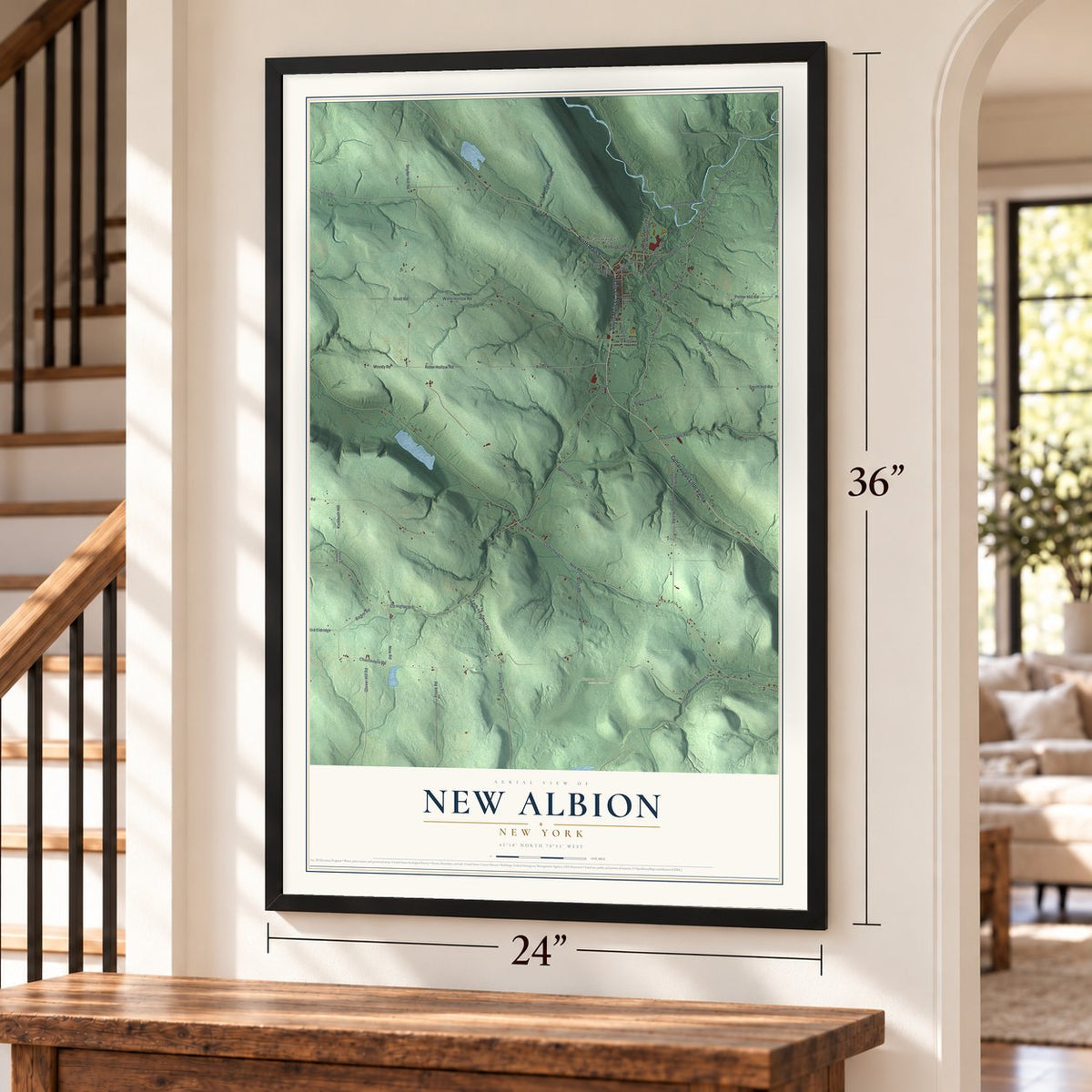 New Albion, New York map, 24 x 36 inch print in a black frame by a staircase