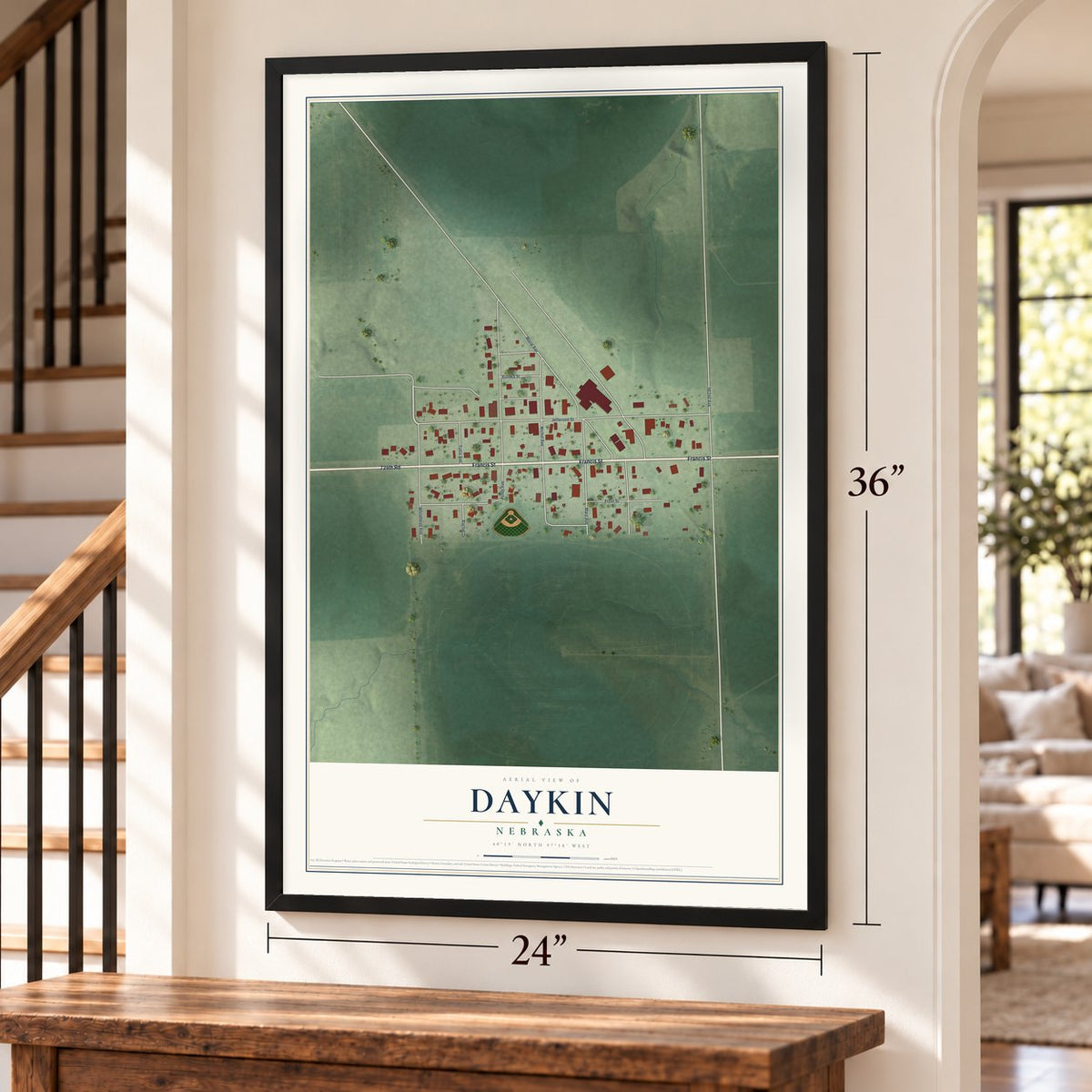 Daykin, Nebraska map, 24 x 36 inch print in a black frame by a staircase