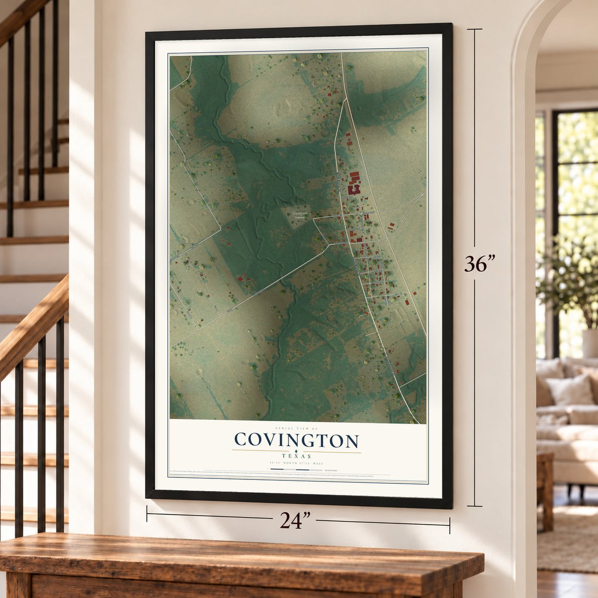 Covington, Texas map, 24 x 36 inch print in a black frame by a staircase