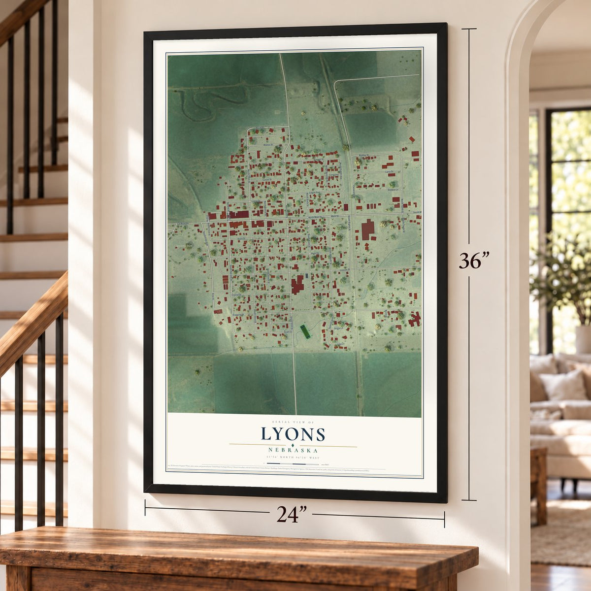 Lyons, Nebraska map, 24 x 36 inch print in a black frame by a staircase