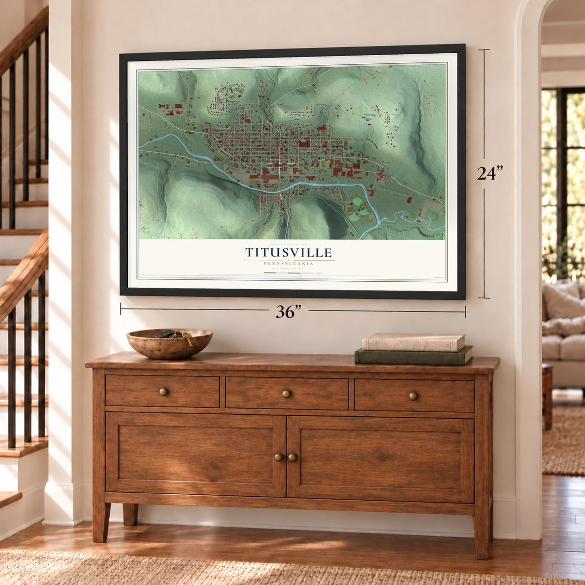 Titusville, Pennsylvania map, 24 x 36 inch print in a black frame above a dresser by a staircase