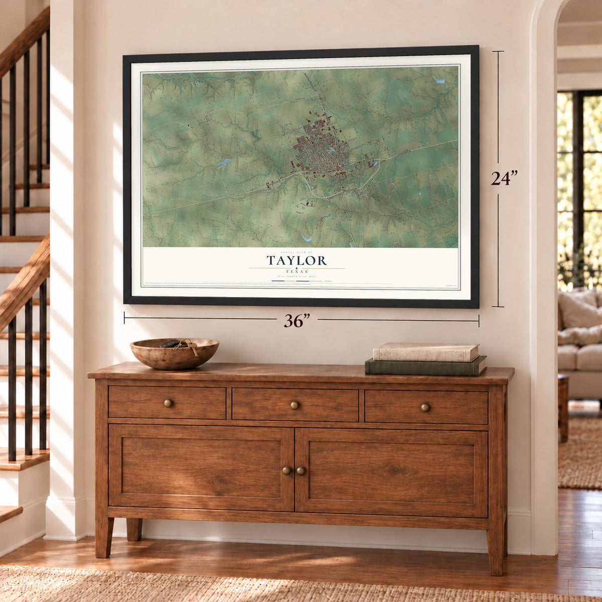 Taylor, Texas map, 24 x 36 inch print in a black frame above a dresser by a staircase