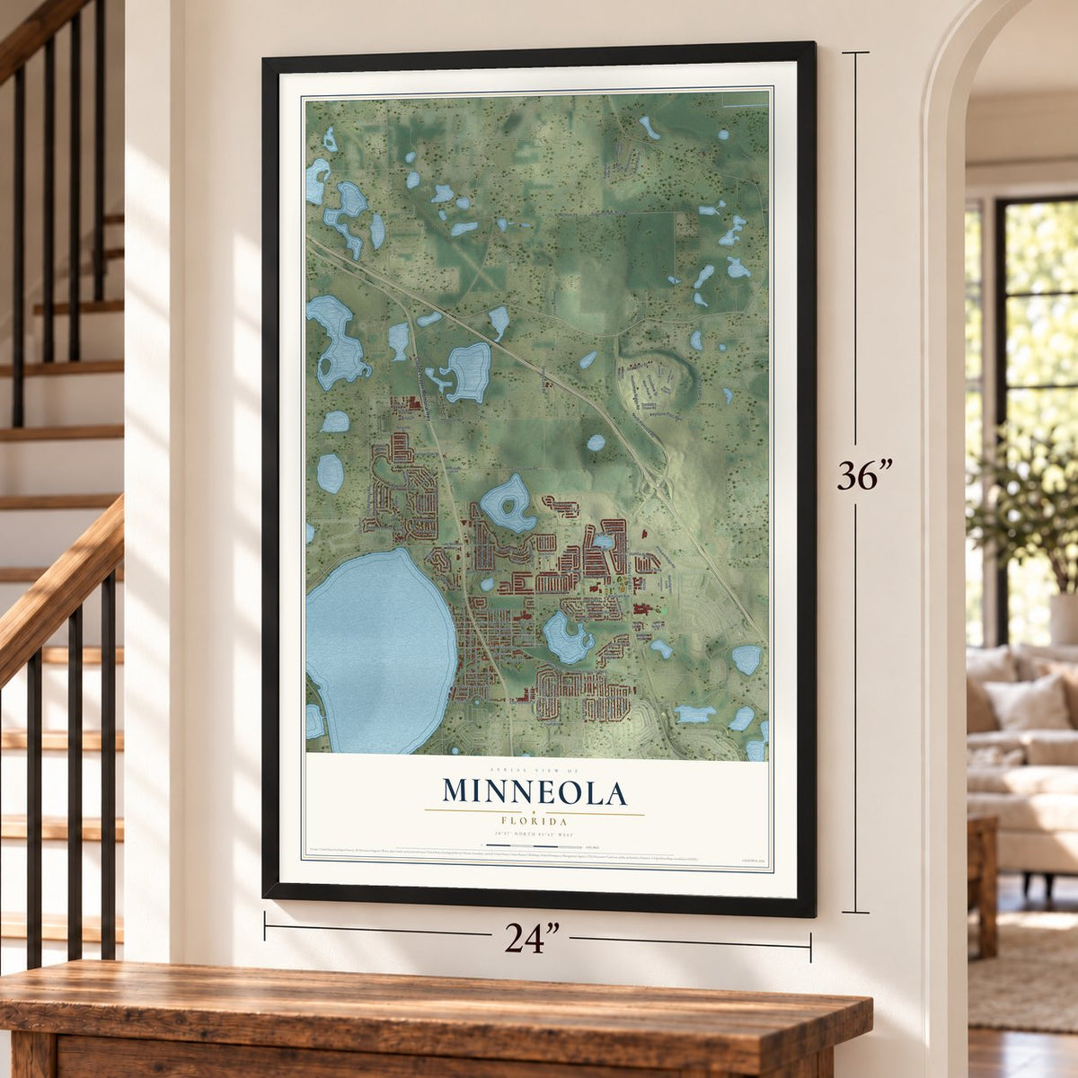 Minneola, Florida map, 24 x 36 inch print in a black frame by a staircase