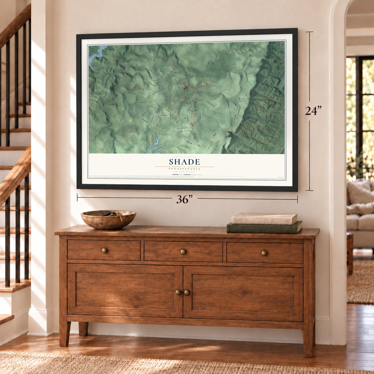 Shade, Pennsylvania map, 24 x 36 inch print in a black frame above a dresser by a staircase