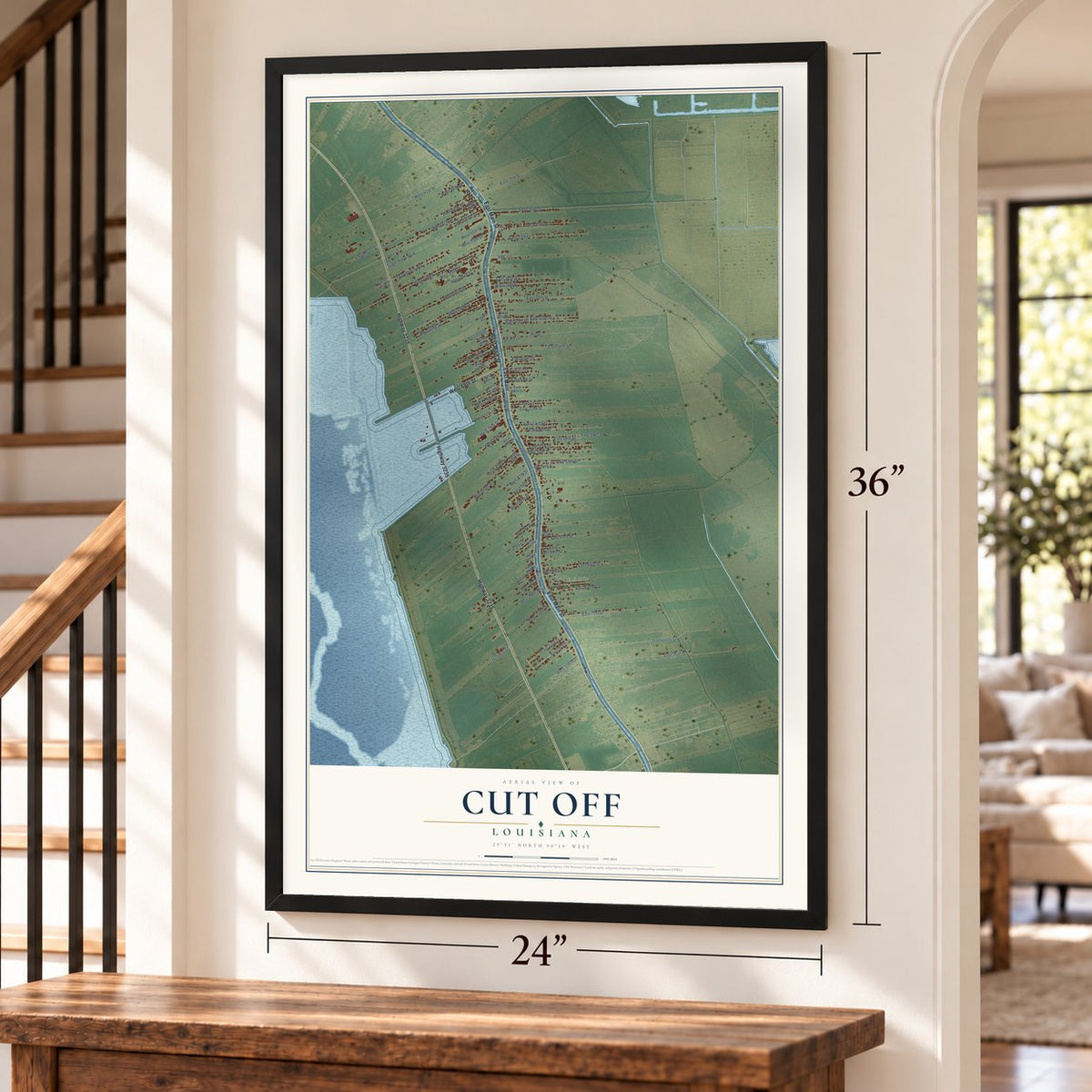 Cut Off, Louisiana map, 24 x 36 inch print in a black frame by a staircase