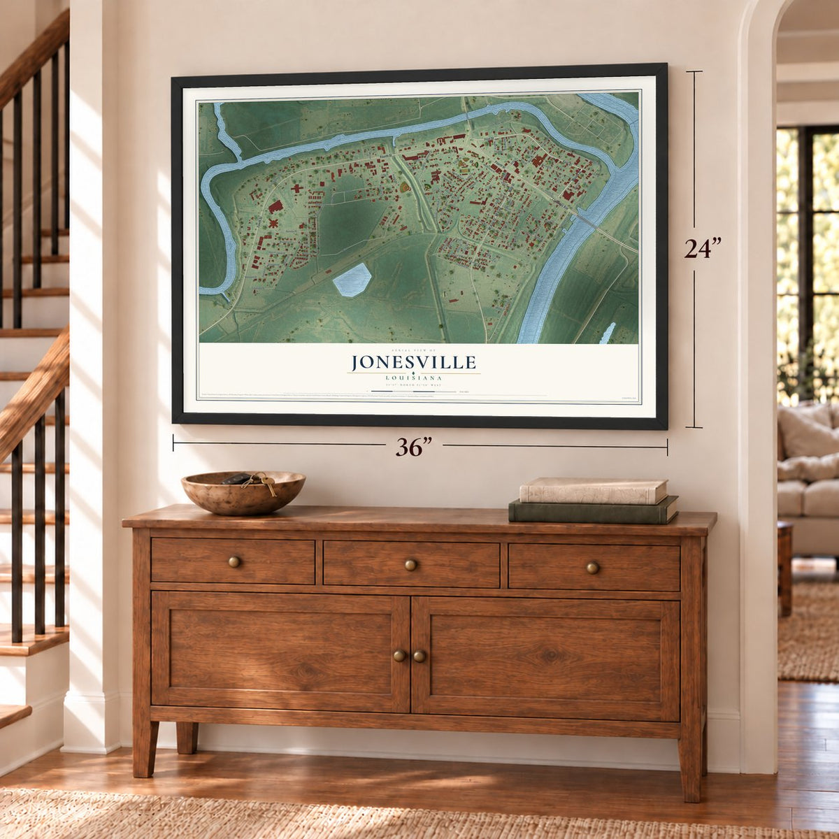 Jonesville, Louisiana map, 24 x 36 inch print in a black frame above a dresser by a staircase