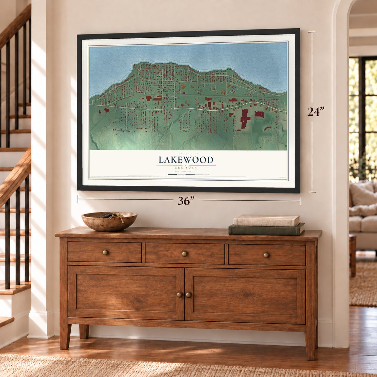 Lakewood, New York map, 24 x 36 inch print in a black frame above a dresser by a staircase