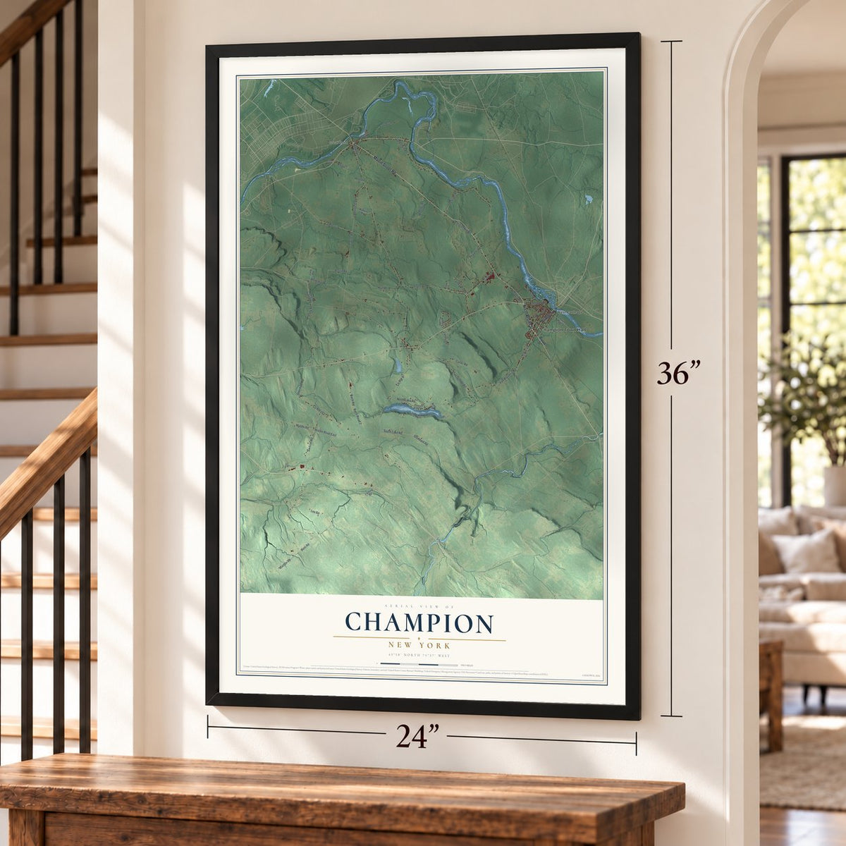 Champion, New York map, 24 x 36 inch print in a black frame by a staircase
