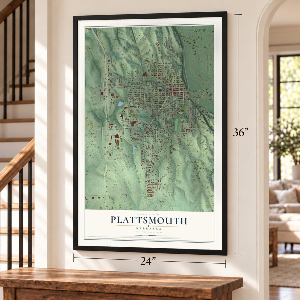 Plattsmouth, Nebraska map, 24 x 36 inch print in a black frame by a staircase