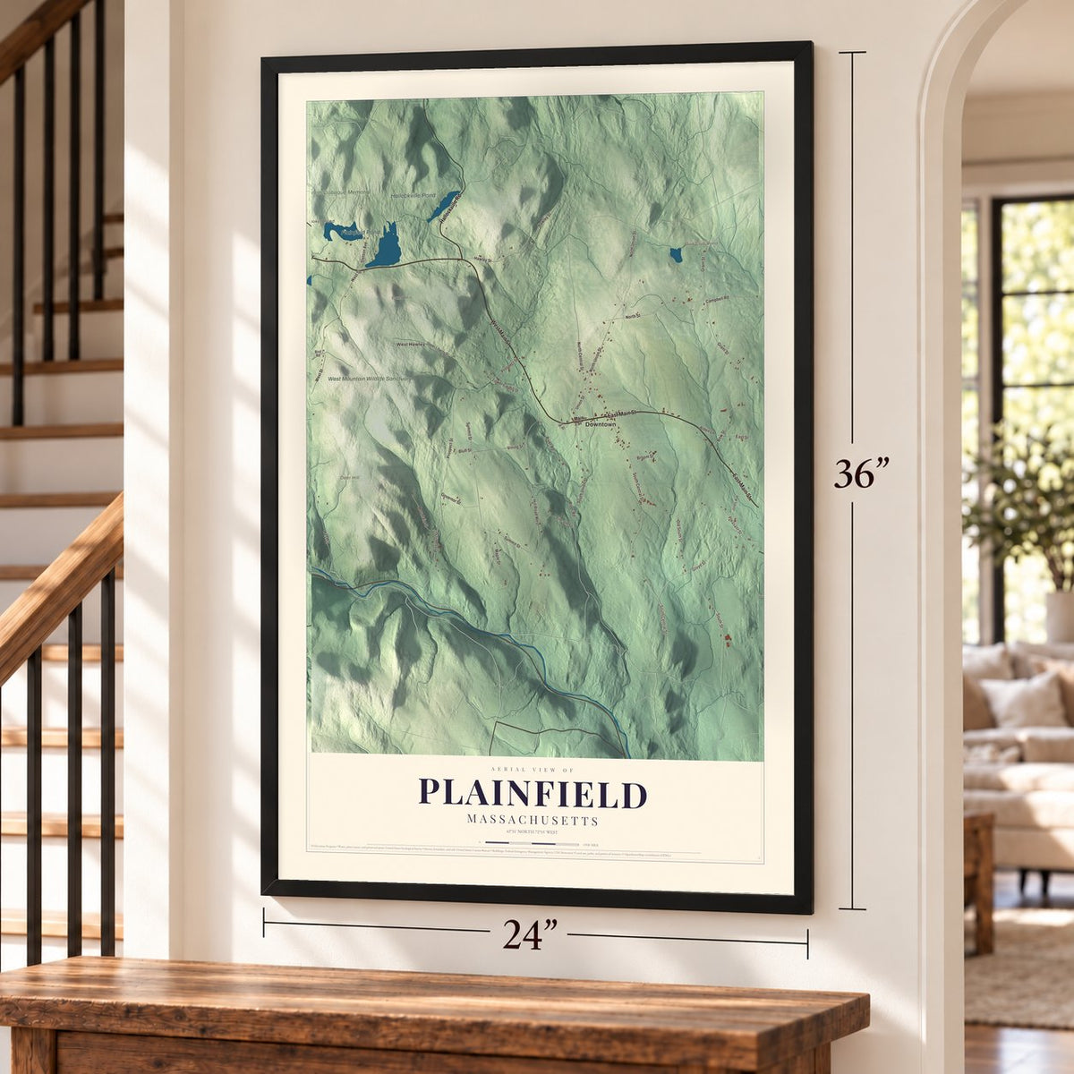 Plainfield, Massachusetts map, 24 x 36 inch print in a black frame by a staircase