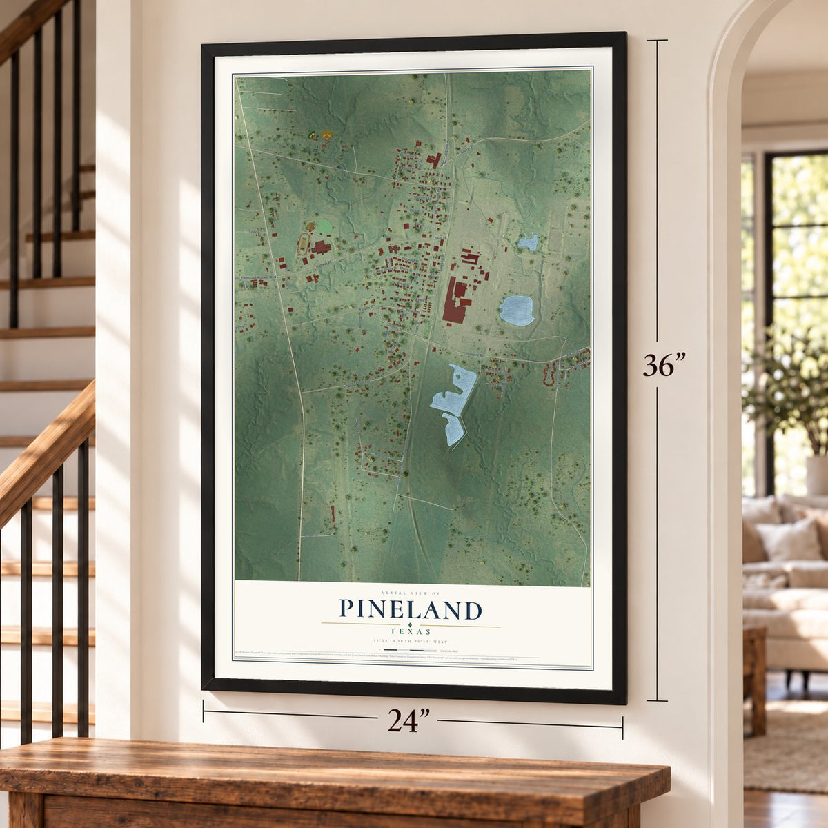 Pineland, Texas map, 24 x 36 inch print in a black frame by a staircase