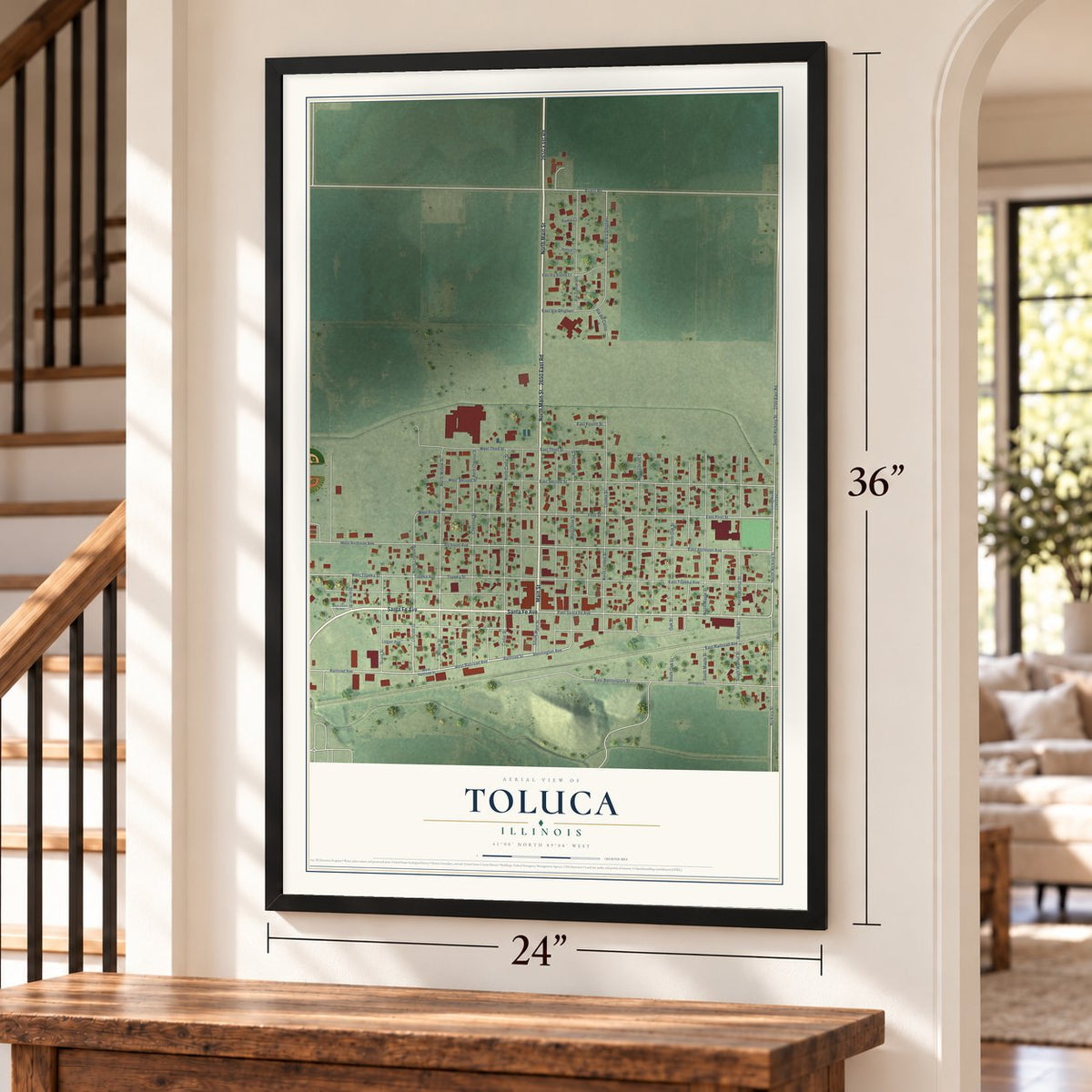 Toluca, Illinois map, 24 x 36 inch print in a black frame by a staircase