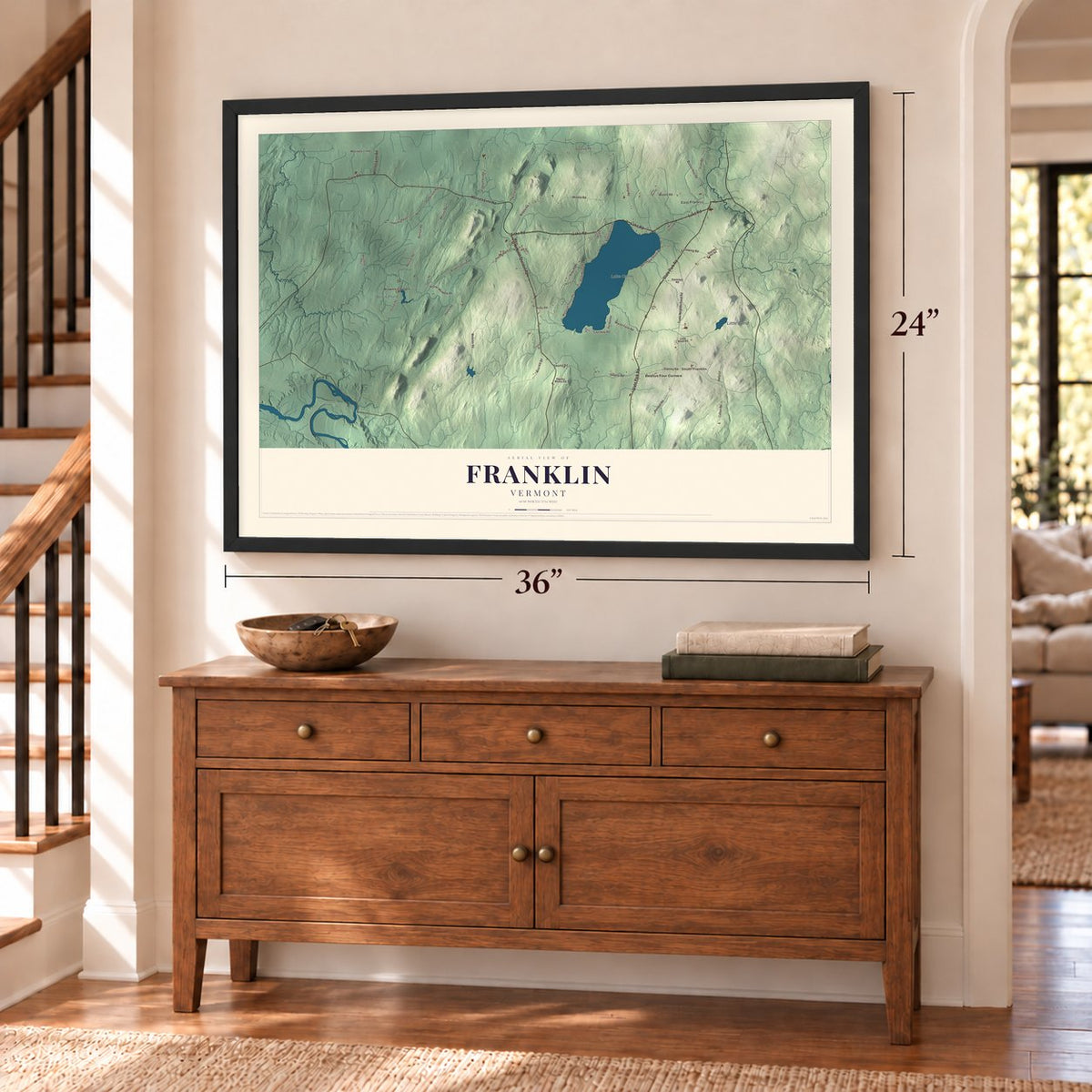 Franklin, Vermont map, 24 x 36 inch print in a black frame above a dresser by a staircase