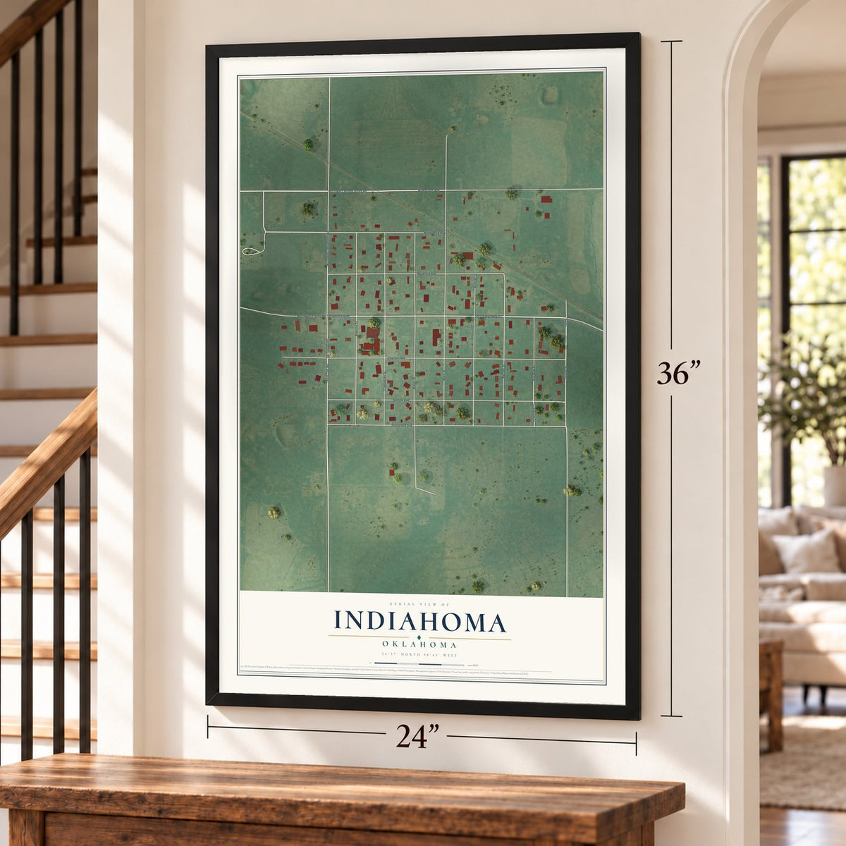 Indiahoma, Oklahoma map, 24 x 36 inch print in a black frame by a staircase