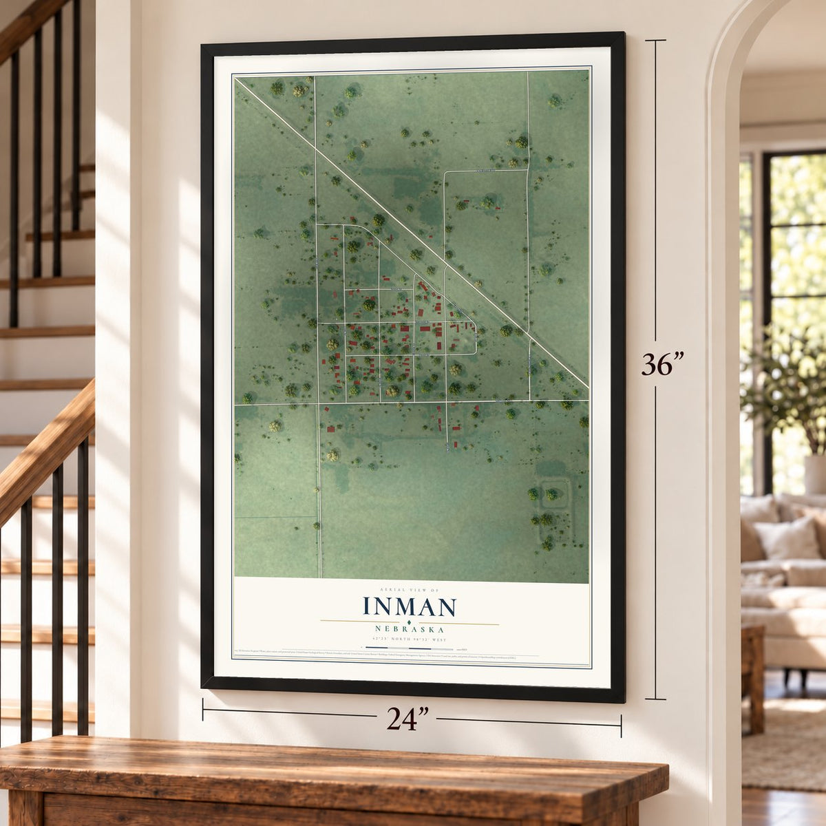Inman, Nebraska map, 24 x 36 inch print in a black frame by a staircase