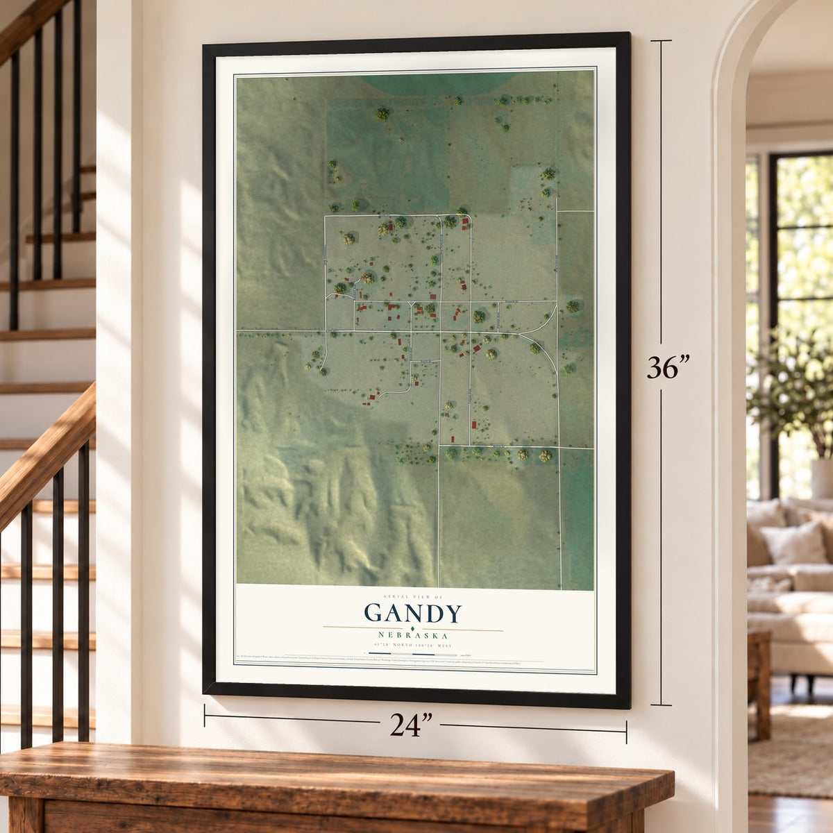 Gandy, Nebraska map, 24 x 36 inch print in a black frame by a staircase