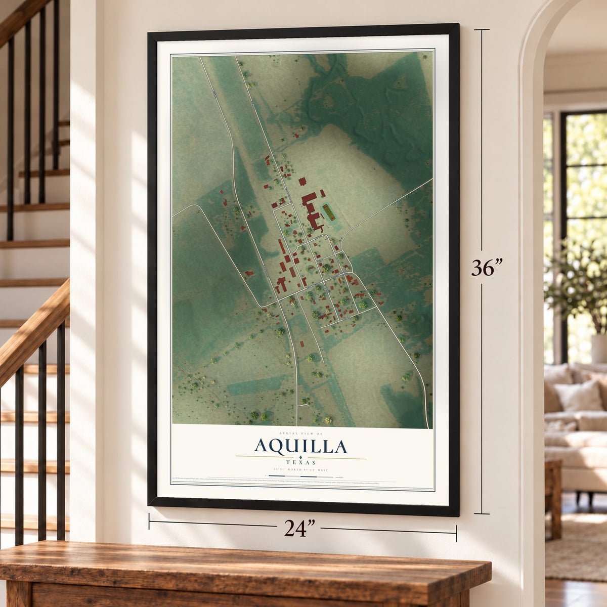 Aquilla, Texas map, 24 x 36 inch print in a black frame by a staircase