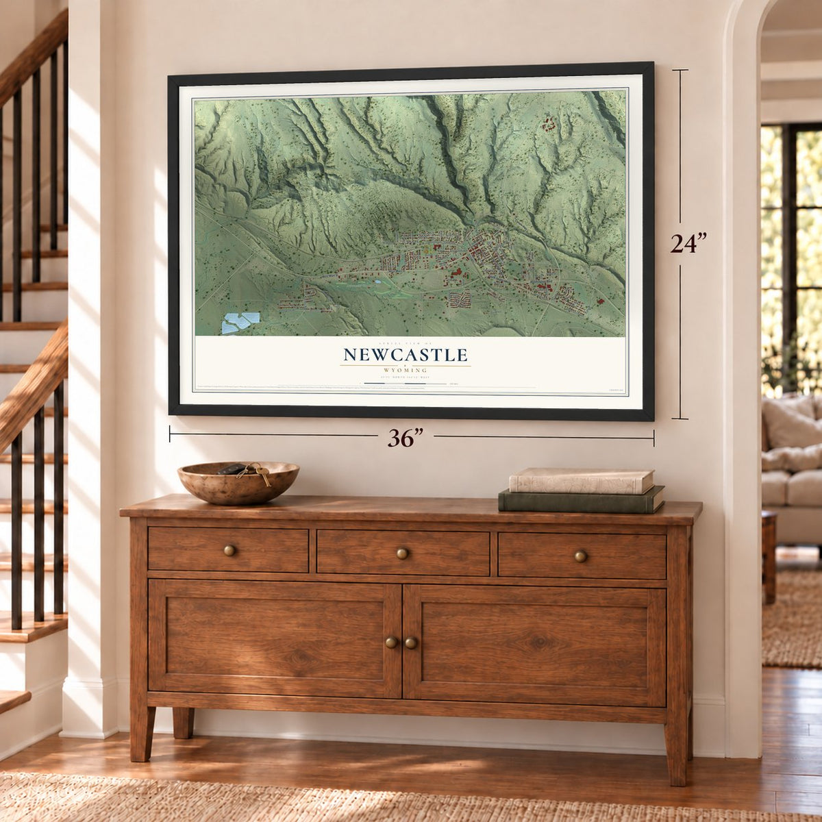Newcastle, Wyoming map, 24 x 36 inch print in a black frame above a dresser by a staircase