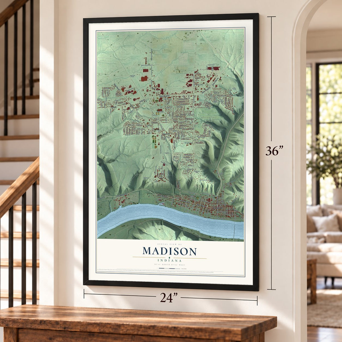 Madison, Indiana map, 24 x 36 inch print in a black frame by a staircase