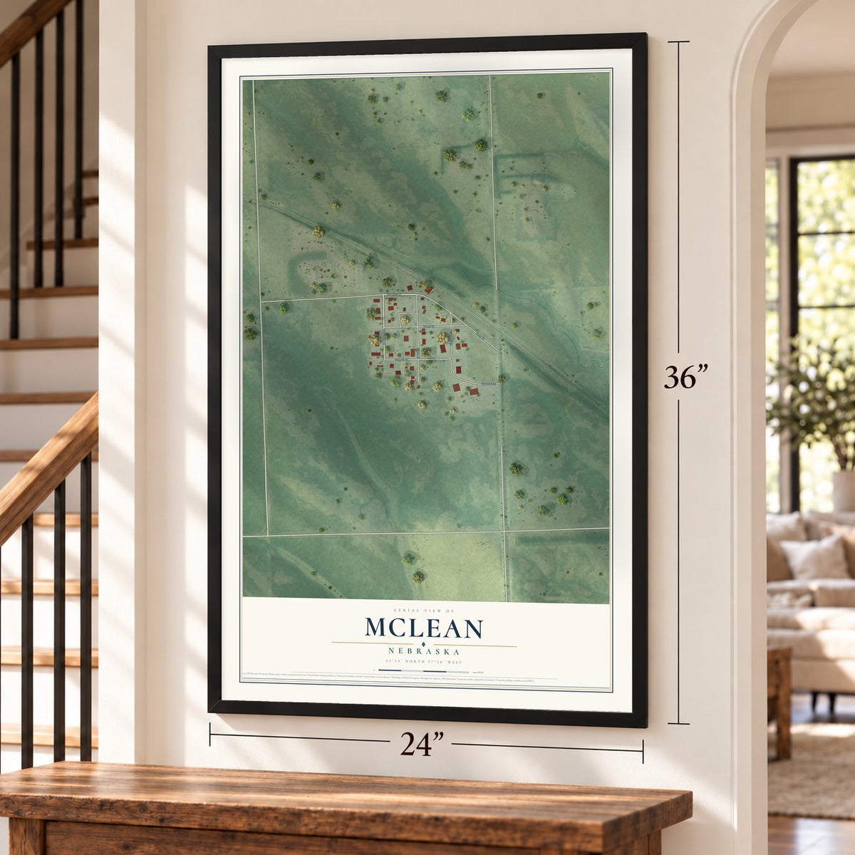 McLean, Nebraska map, 24 x 36 inch print in a black frame by a staircase
