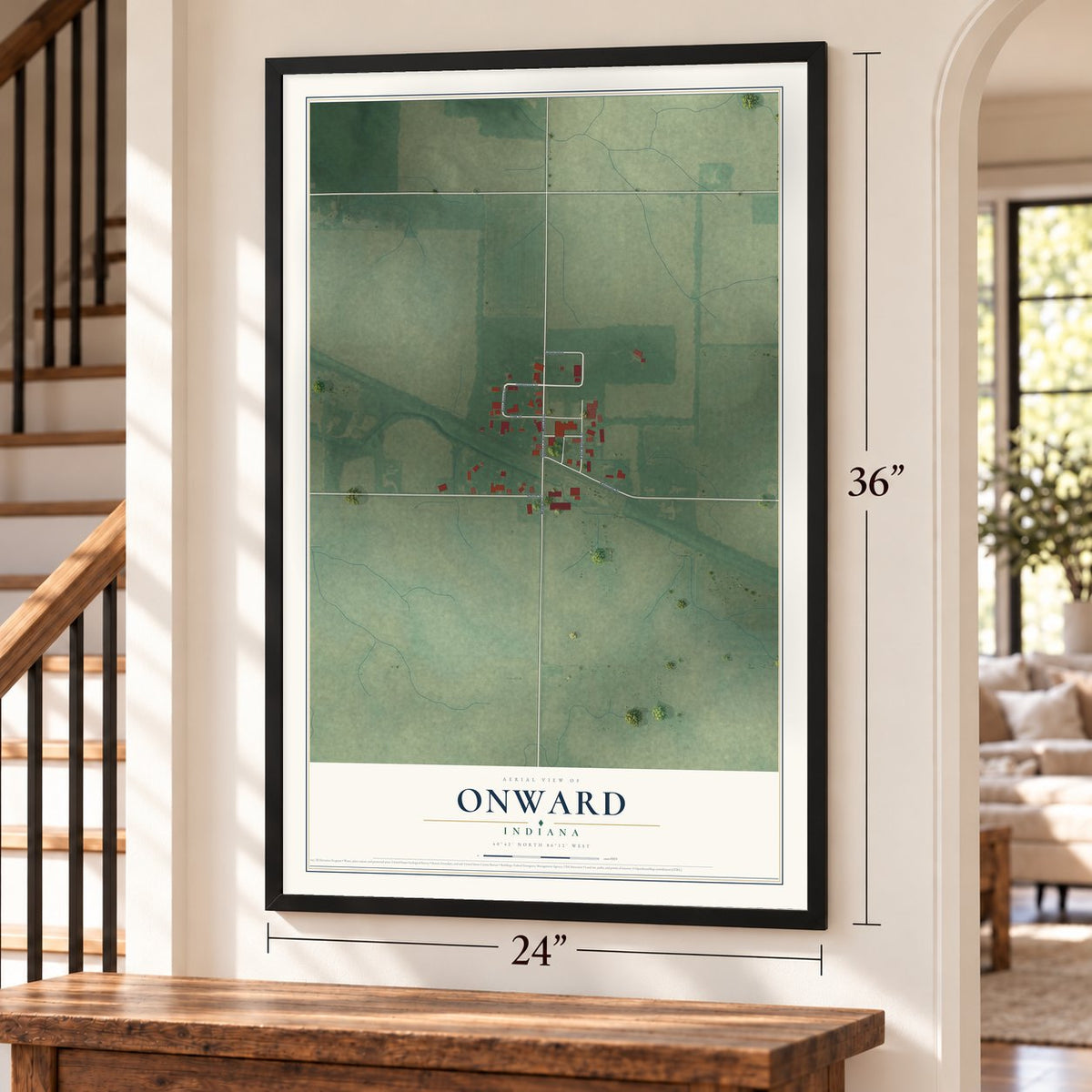 Onward, Indiana map, 24 x 36 inch print in a black frame by a staircase