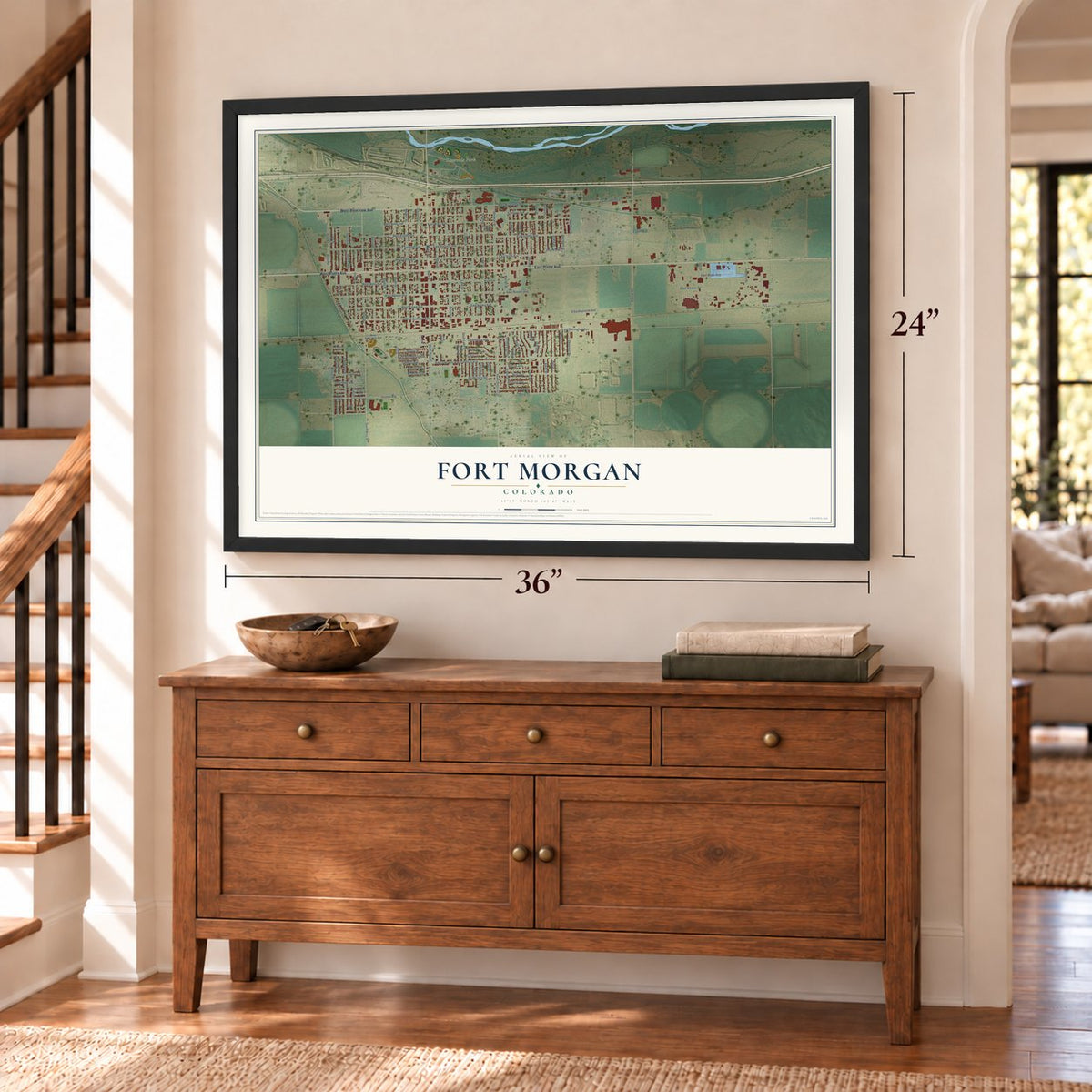 Fort Morgan, Colorado map, 24 x 36 inch print in a black frame above a dresser by a staircase