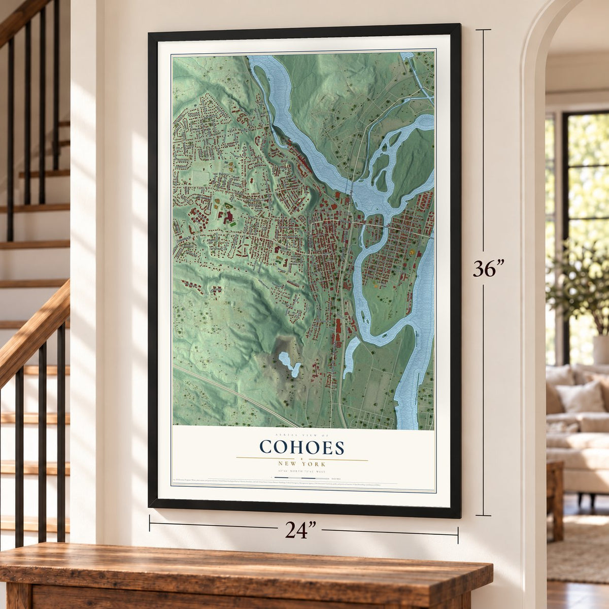 Cohoes, New York map, 24 x 36 inch print in a black frame by a staircase