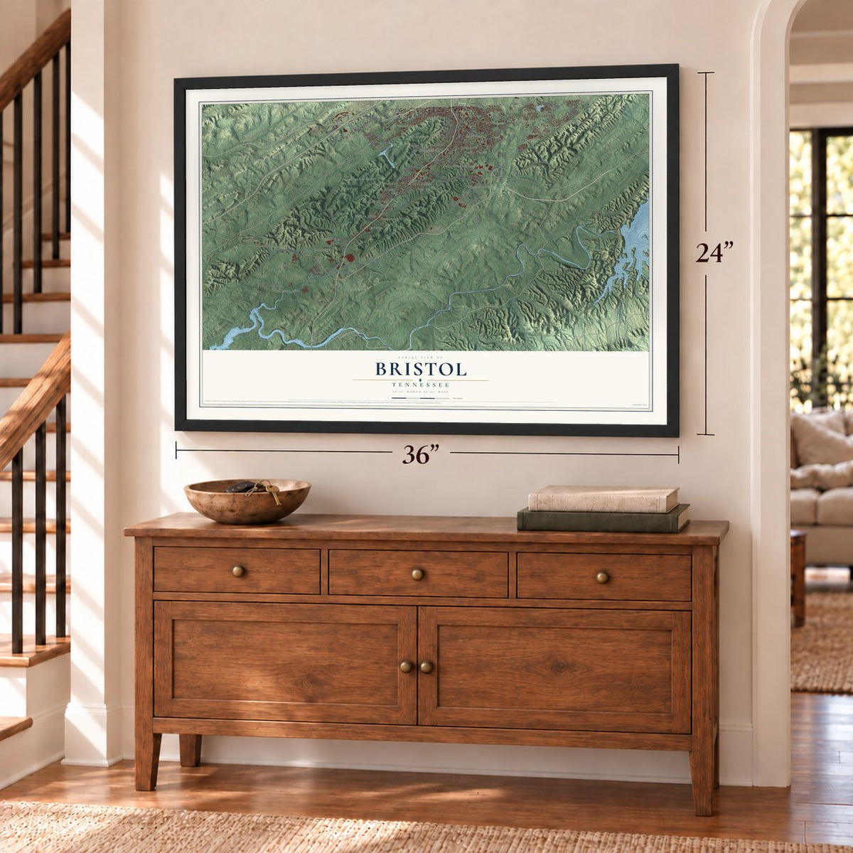 Bristol, Tennessee map, 24 x 36 inch print in a black frame above a dresser by a staircase