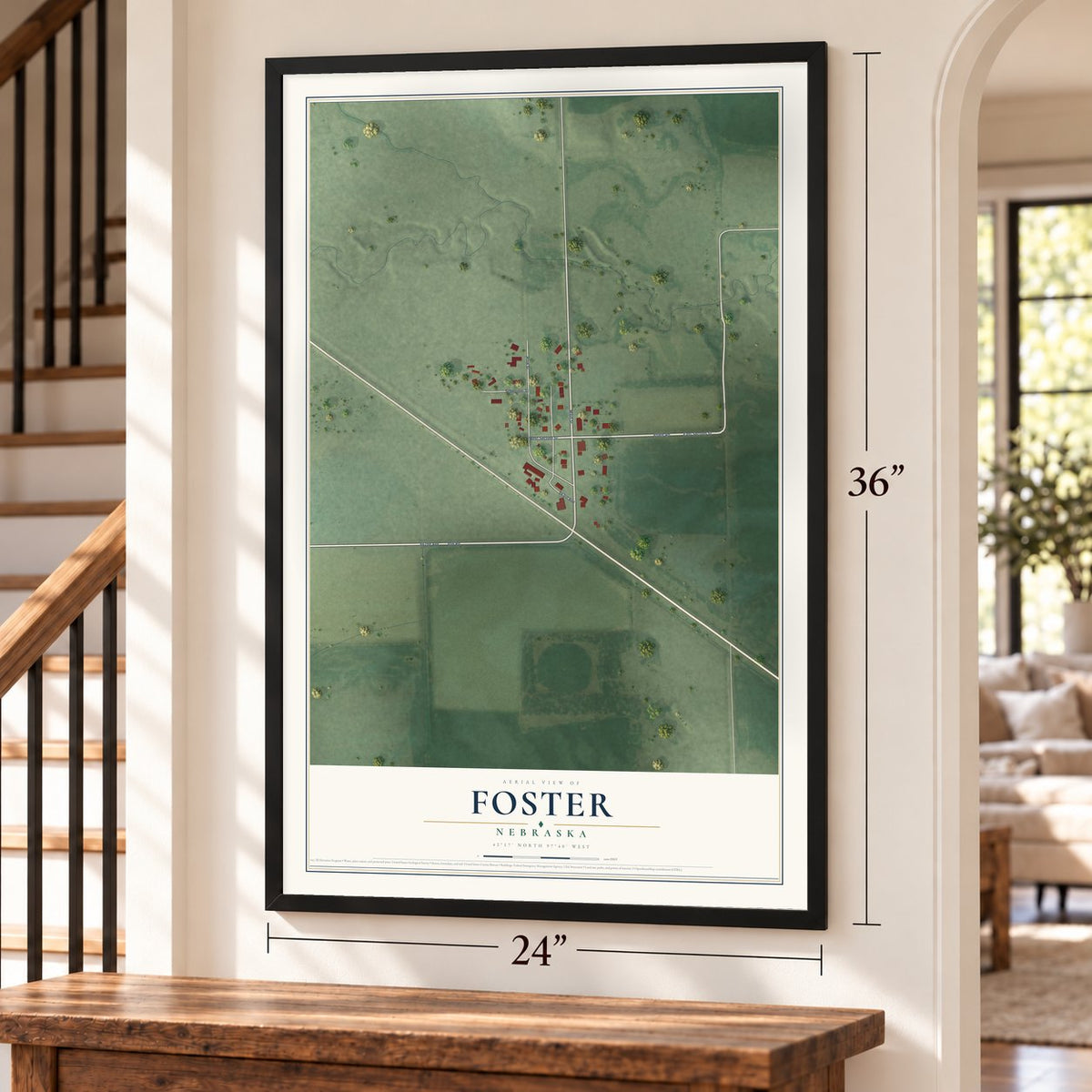 Foster, Nebraska map, 24 x 36 inch print in a black frame by a staircase