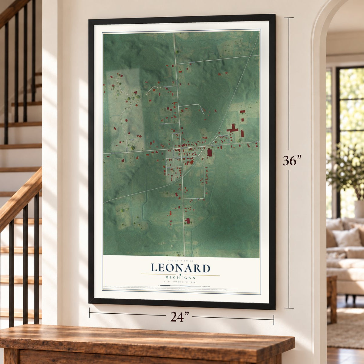 Leonard, Michigan map, 24 x 36 inch print in a black frame by a staircase