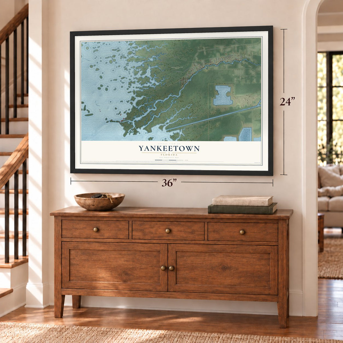 Yankeetown, Florida map, 24 x 36 inch print in a black frame above a dresser by a staircase